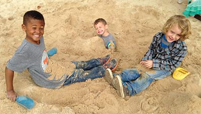 boys-playing-in-sandbox
